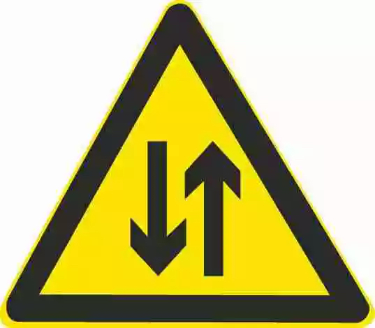 这个标志的含义是提醒前方道路变为不分离双向行驶路段。