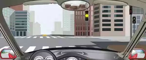 驾驶机动车遇到这种信号灯亮时，如果已越过停止线，可以继续通行。